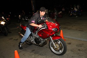 Registration Coordinator, Dawn Chappell, destroyed the "Bike Walk" competition in just four seconds on her SV650.